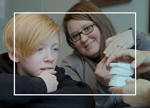 Child smiling during an orthodontic visit